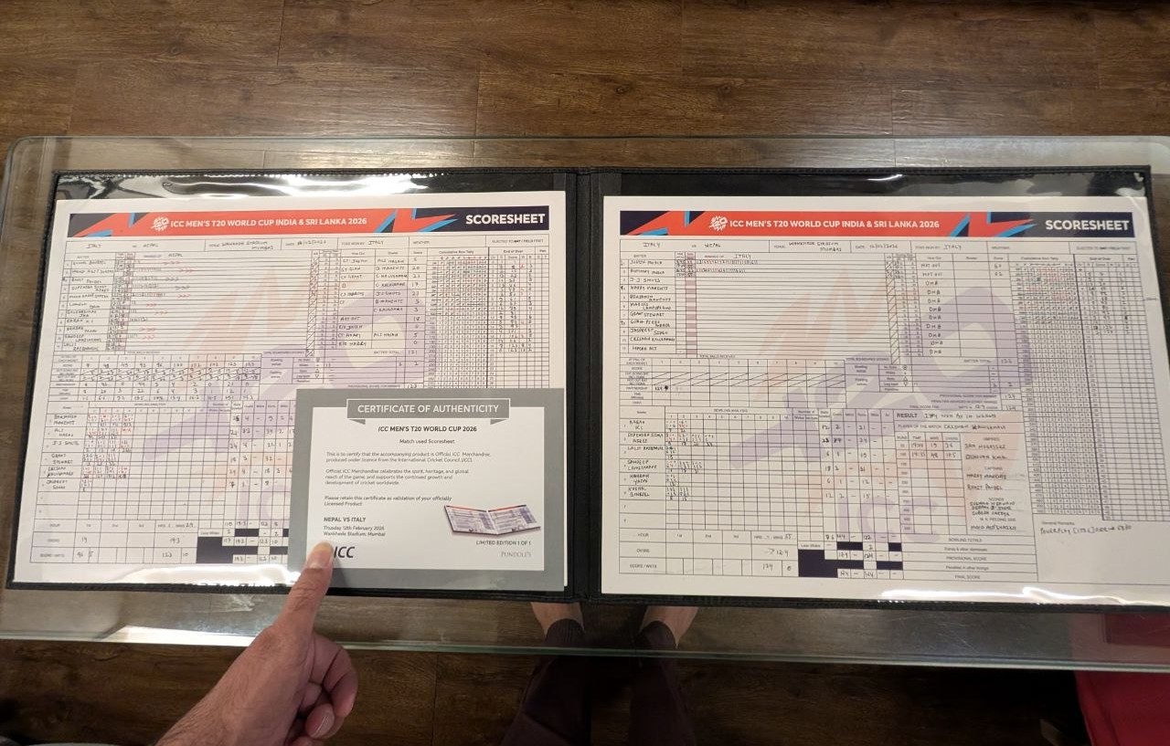 Official ICC Signed Match Scorecard — Nepal vs Italy T20 World Cup 2026, showing both innings scoresheets in presentation binder with Certificate of Authenticity.